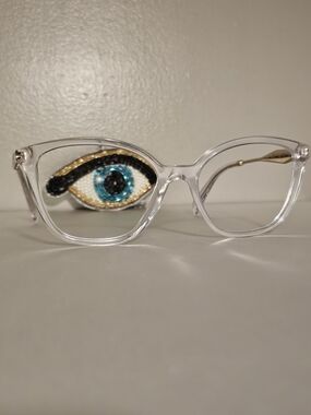 PRADA Glasses – Transparent Frame, Gold Temples
